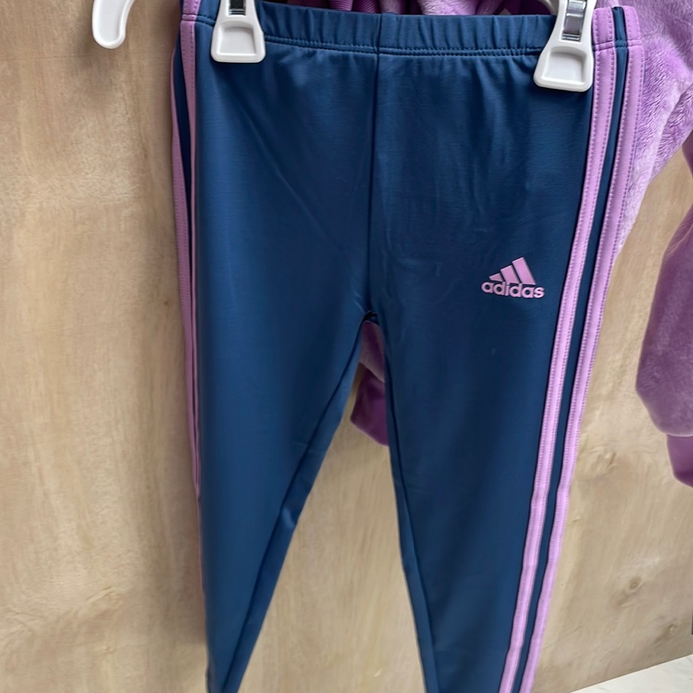 Brand new purple girl sweater and pans